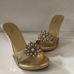 Wild Pair gold heels with flower accent